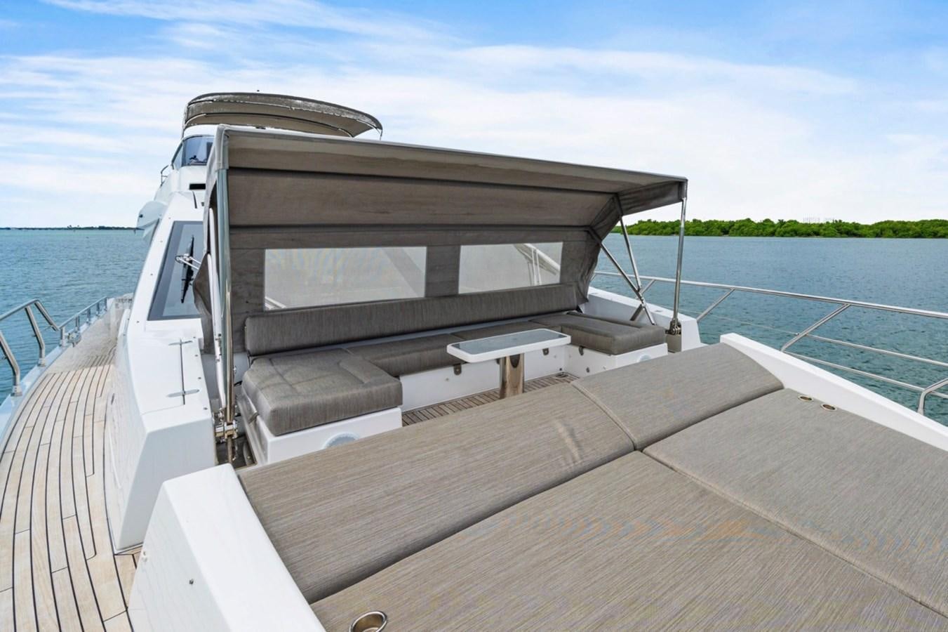 a boat on a deck aboard JUST KEEP LIVIN Yacht for Sale