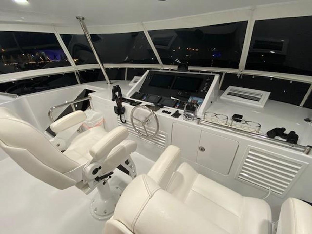 a room with a large white sink and a large white machine aboard ISLAND GIRL Yacht for Sale