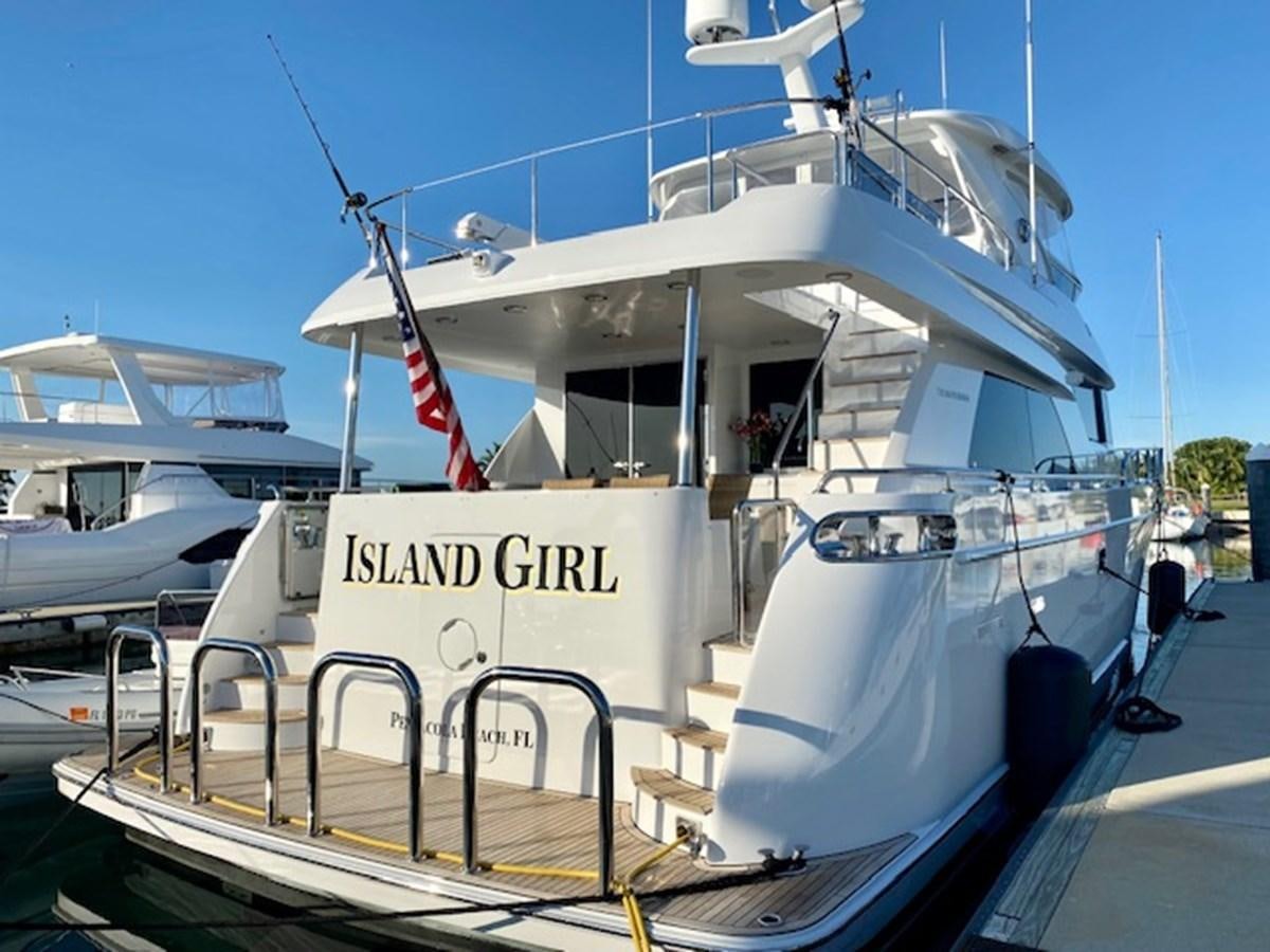 a boat docked at a pier aboard ISLAND GIRL Yacht for Sale