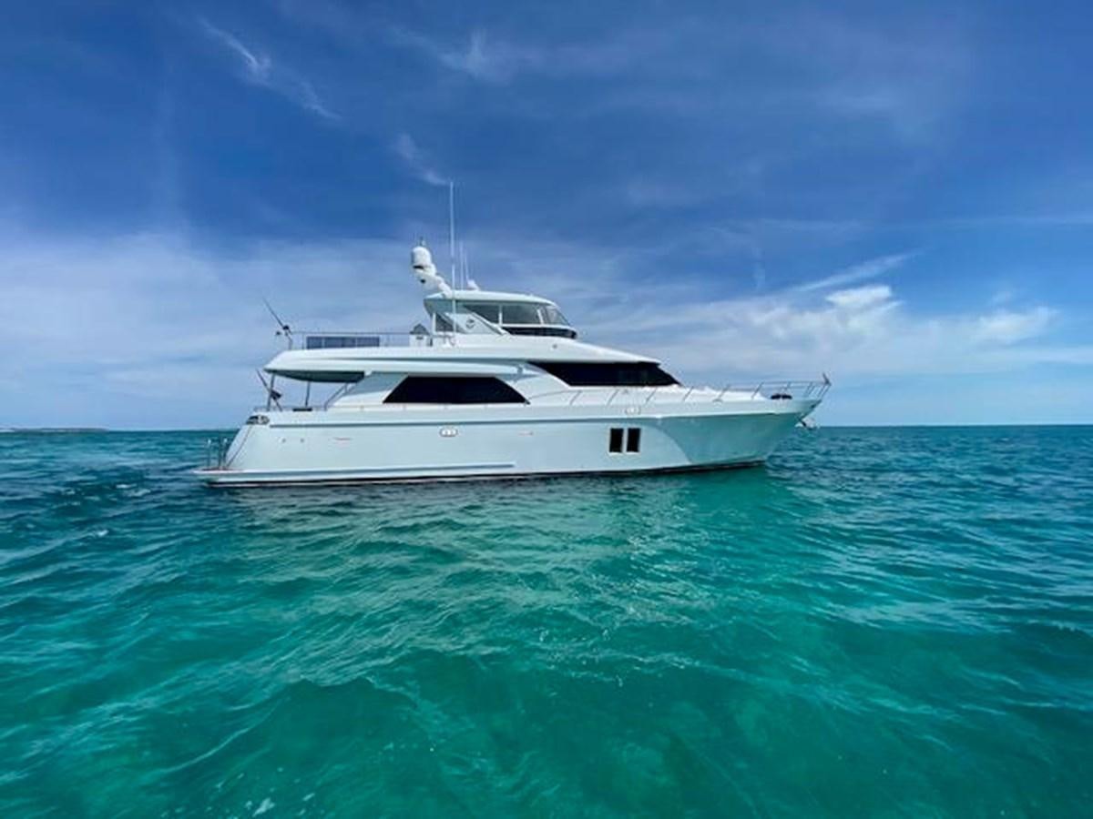 a white boat in the water aboard ISLAND GIRL Yacht for Sale