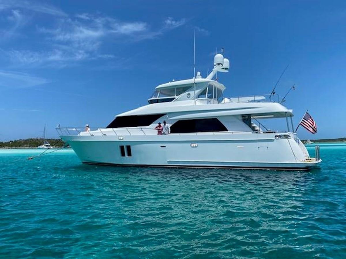a white boat in the water aboard ISLAND GIRL Yacht for Sale