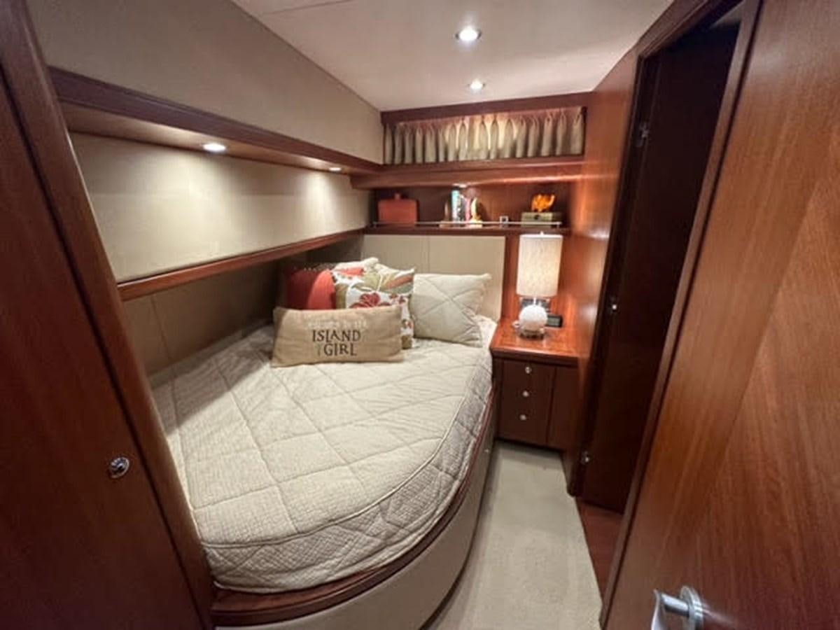 a bed in a room aboard ISLAND GIRL Yacht for Sale