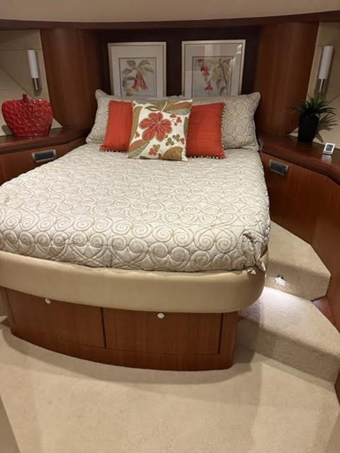 a bed with pillows aboard ISLAND GIRL Yacht for Sale