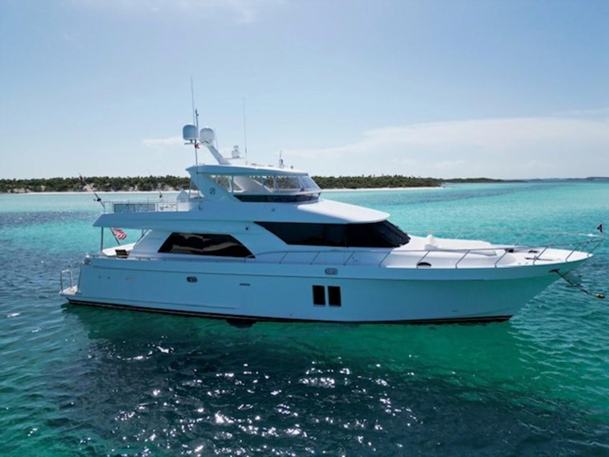 a white yacht in the water aboard ISLAND GIRL Yacht for Sale