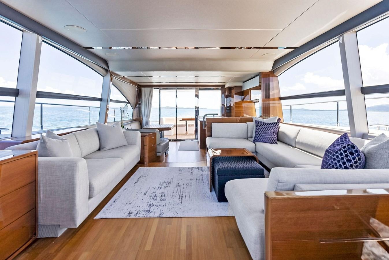 a living room with a large window aboard SOLIANA Yacht for Sale