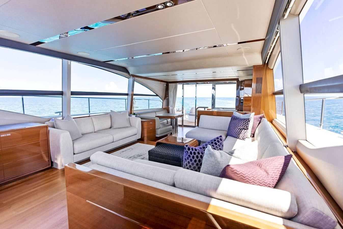 a living room with a large window aboard SOLIANA Yacht for Sale