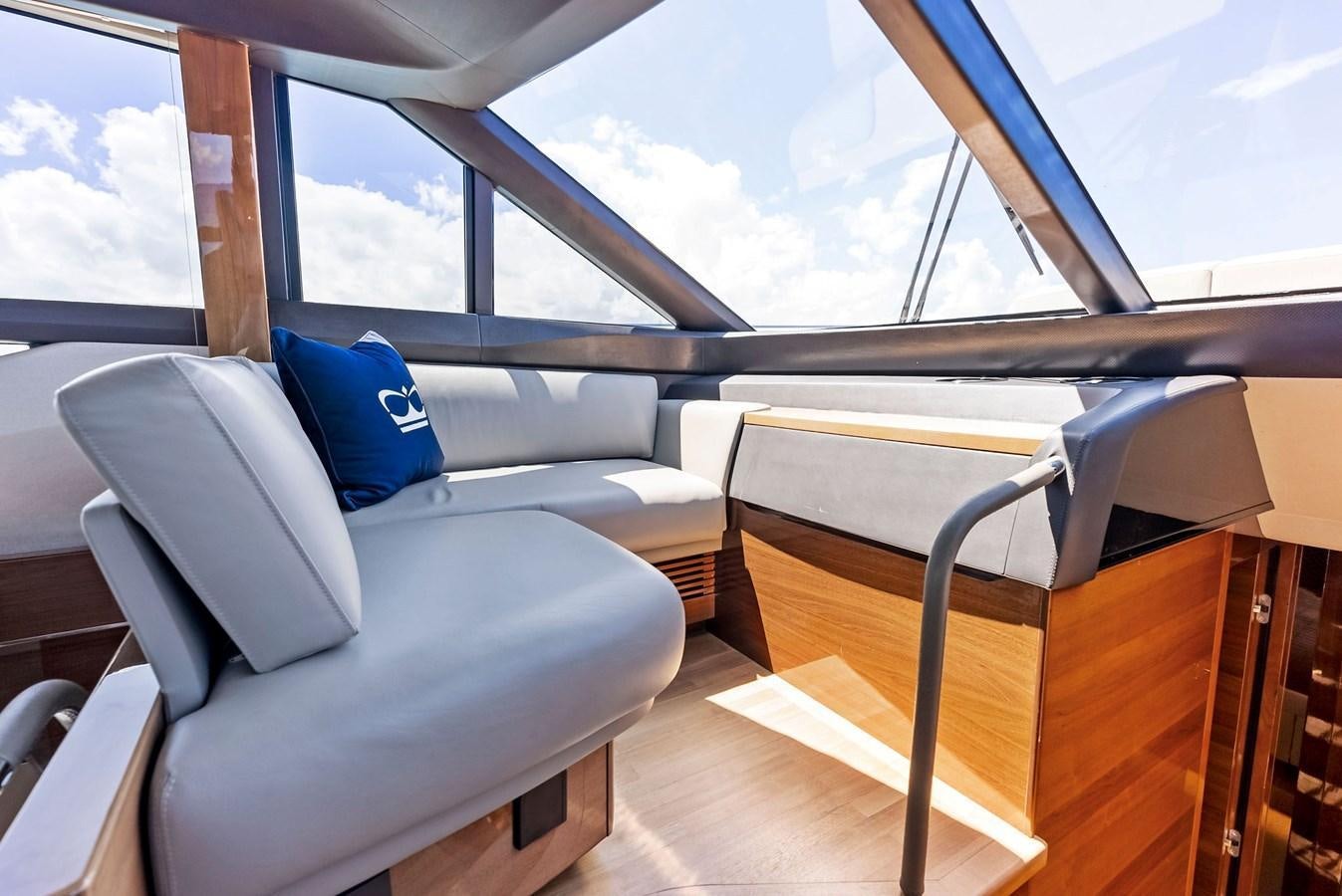 a room with a couch and a window aboard SOLIANA Yacht for Sale