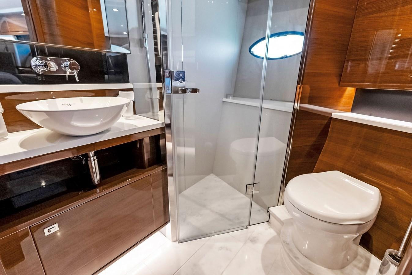 a bathroom with a glass shower aboard SOLIANA Yacht for Sale