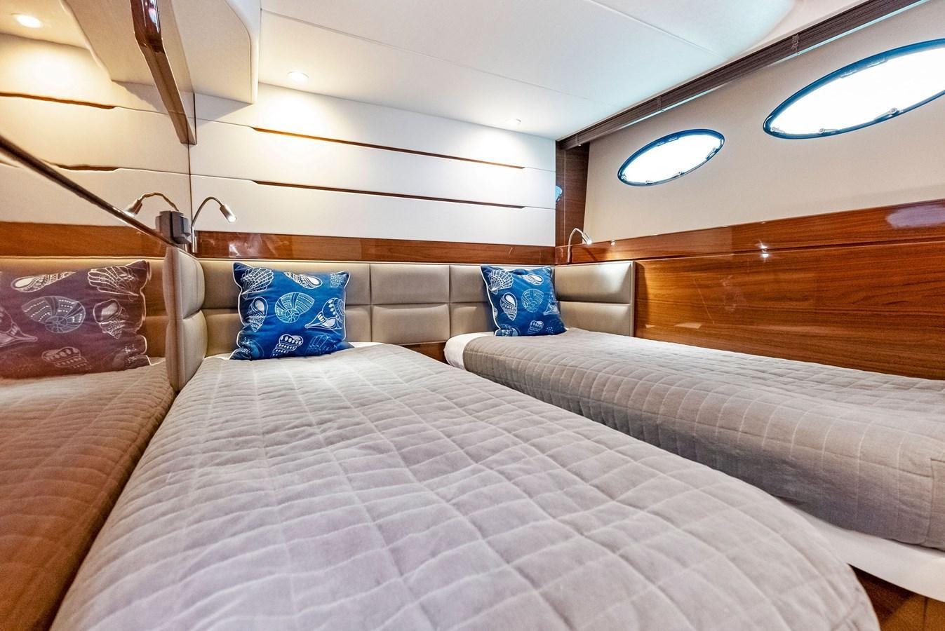 a bed with pillows aboard SOLIANA Yacht for Sale