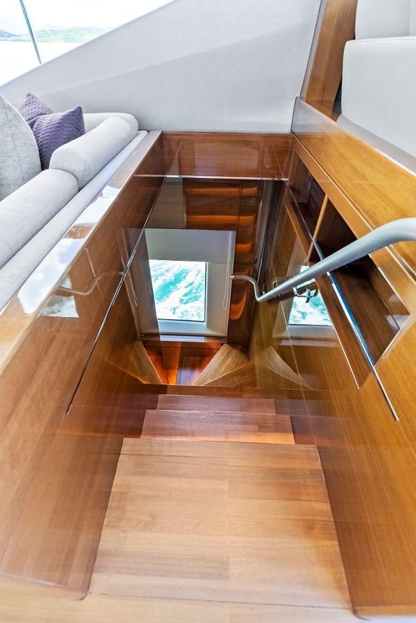 a room with a couch and a table aboard SOLIANA Yacht for Sale