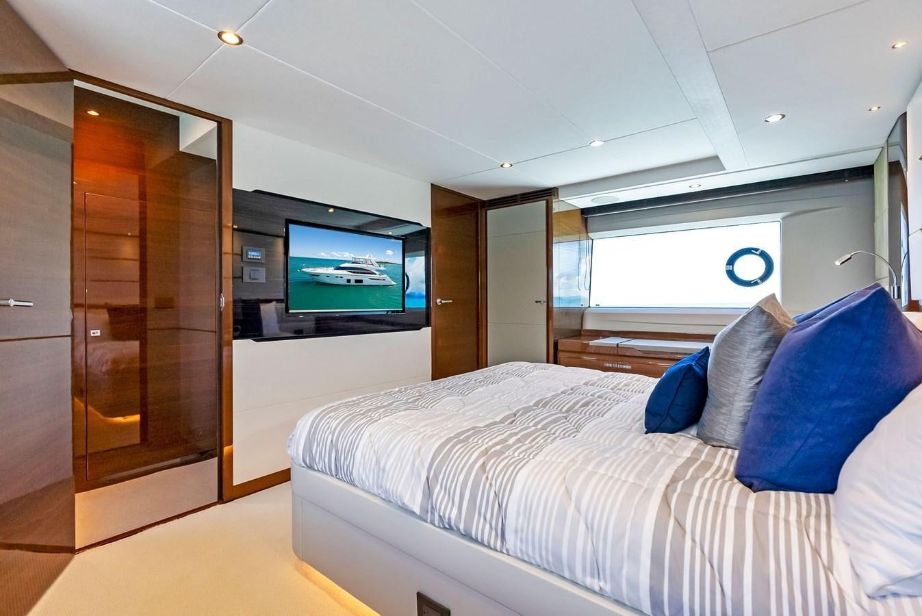 a bedroom with a large bed aboard SOLIANA Yacht for Sale