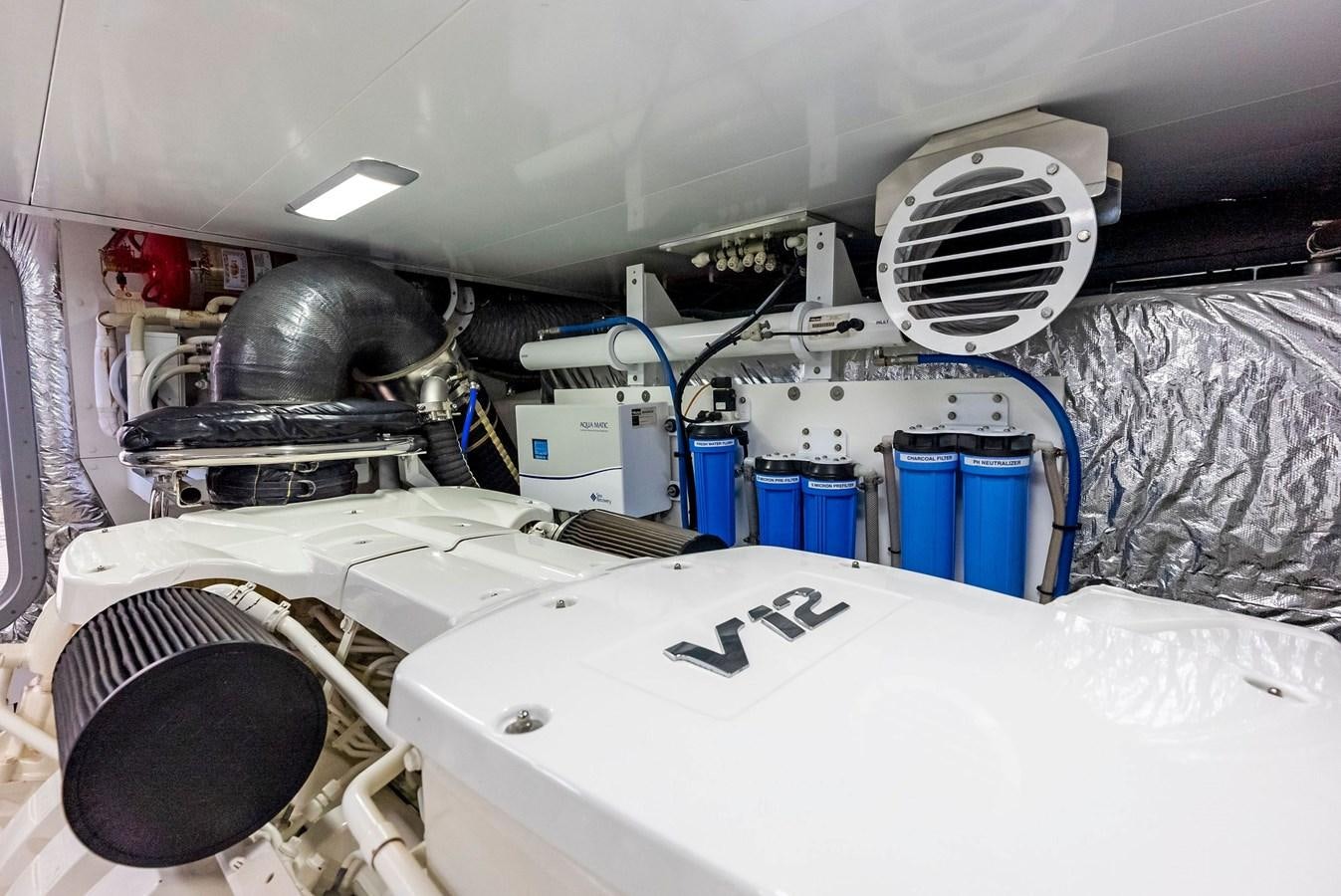 a car with a white hood aboard SOLIANA Yacht for Sale