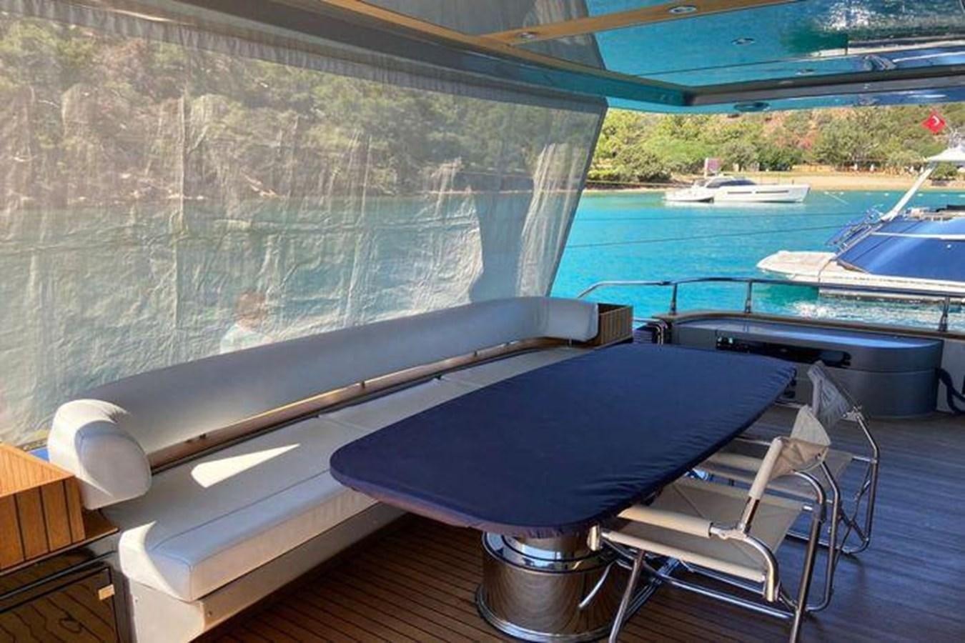a pool table with chairs aboard RIVA 85 OPERA SUPER Yacht for Sale