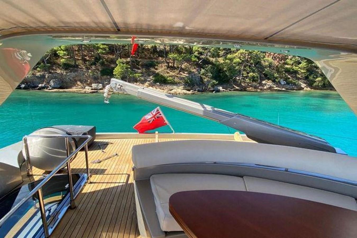 a pool with a pool and a beach and trees in the background aboard RIVA 85 OPERA SUPER Yacht for Sale