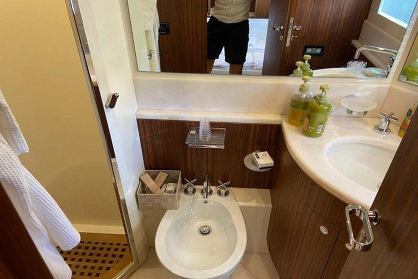 a bathroom with two sinks aboard RIVA 85 OPERA SUPER Yacht for Sale