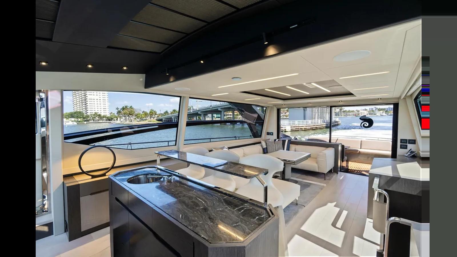 inside view of a room with a table and chairs aboard 2023 80' PERSHING 8X Yacht for Sale