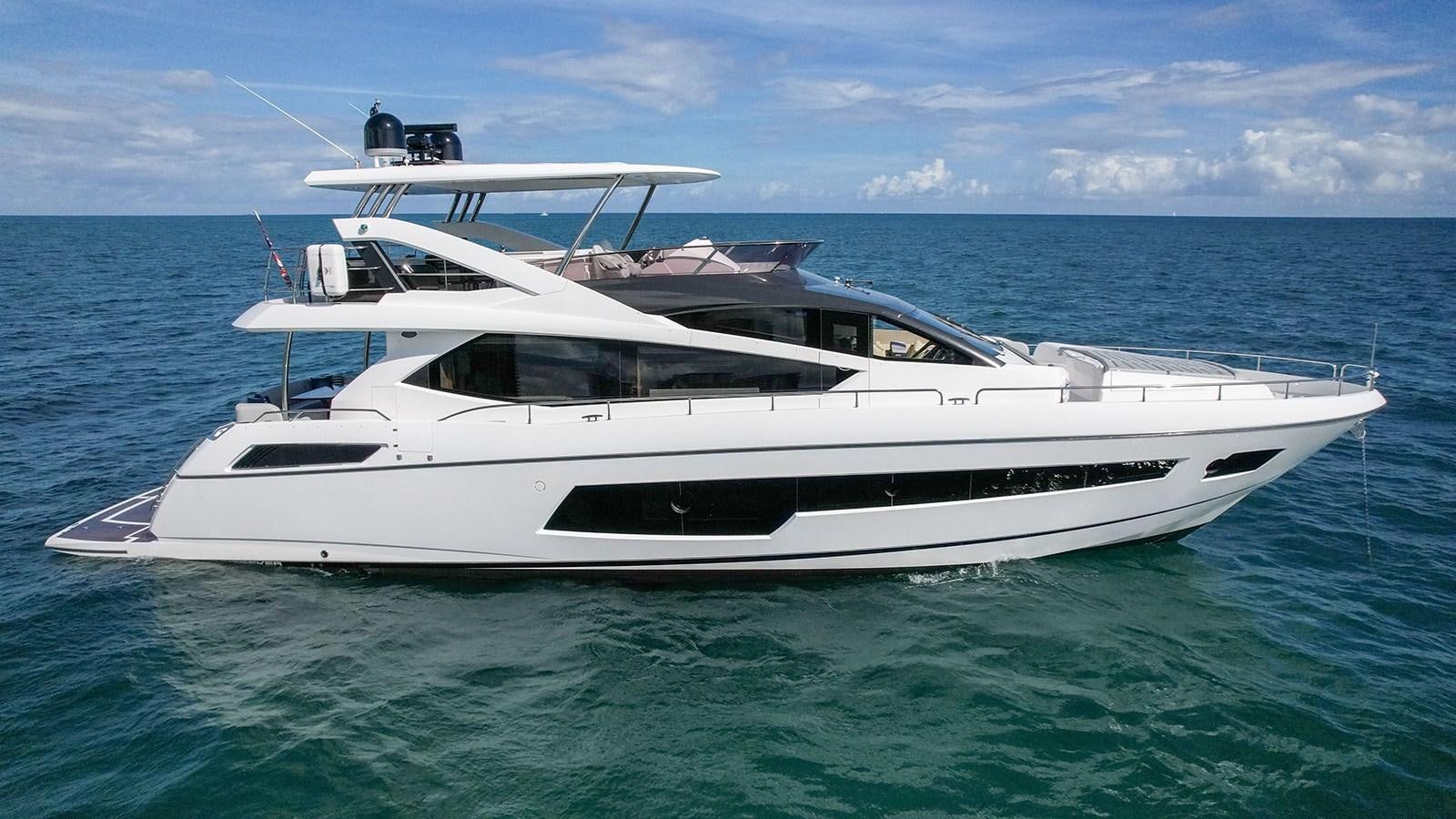 a white yacht in the ocean aboard M4 Yacht for Sale