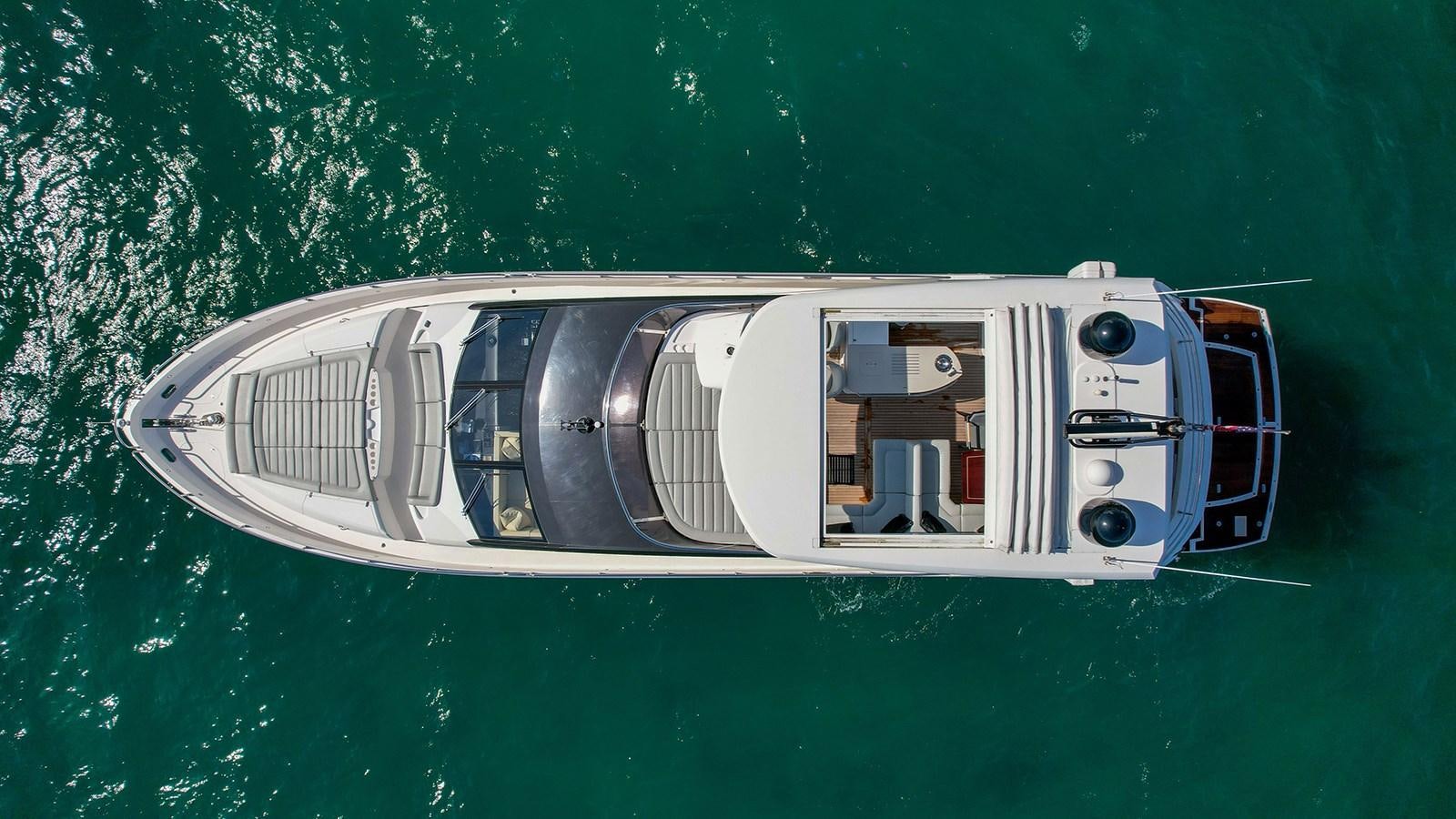 a white and blue vehicle aboard M4 Yacht for Sale