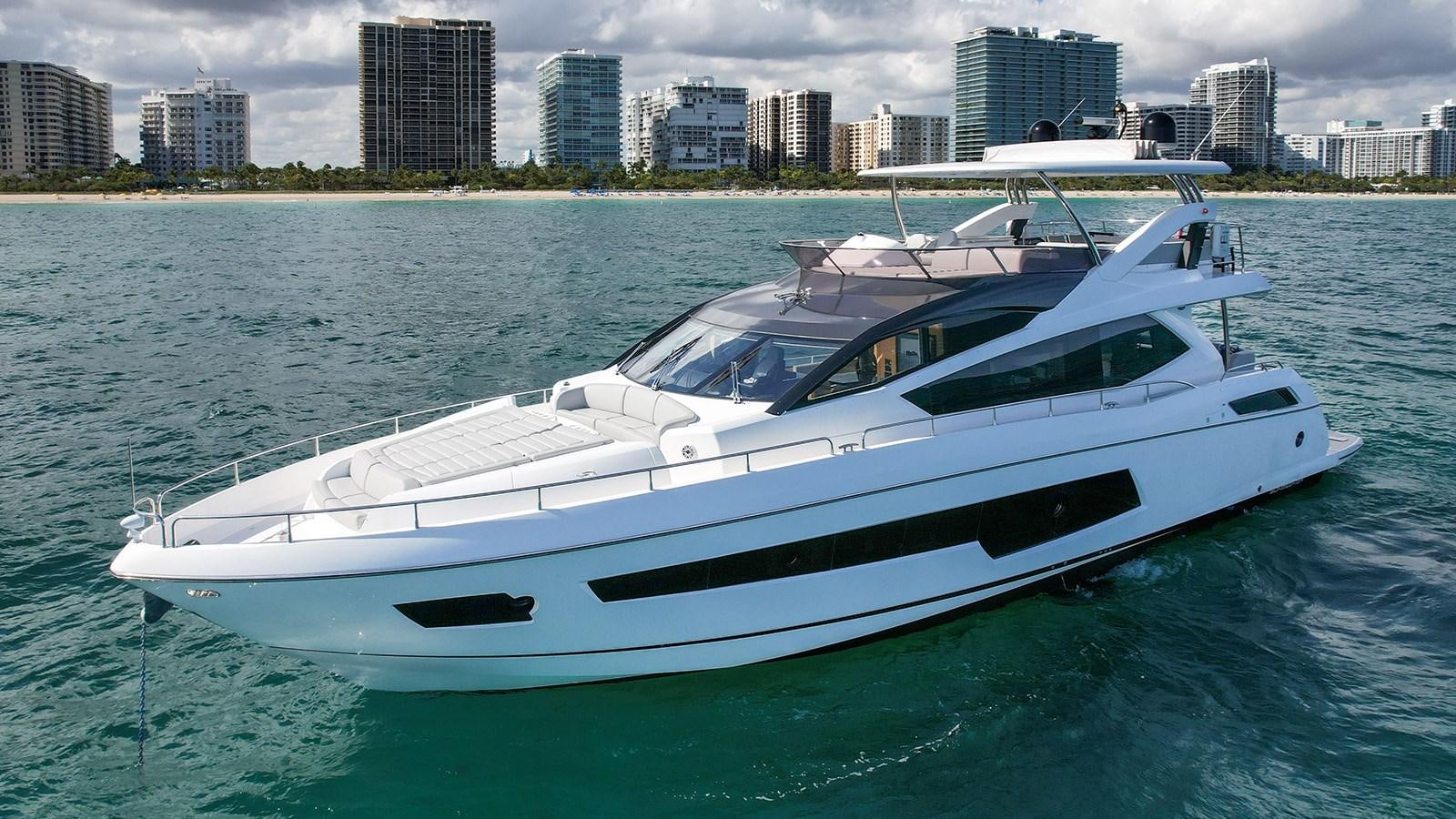 a white yacht in the water aboard M4 Yacht for Sale