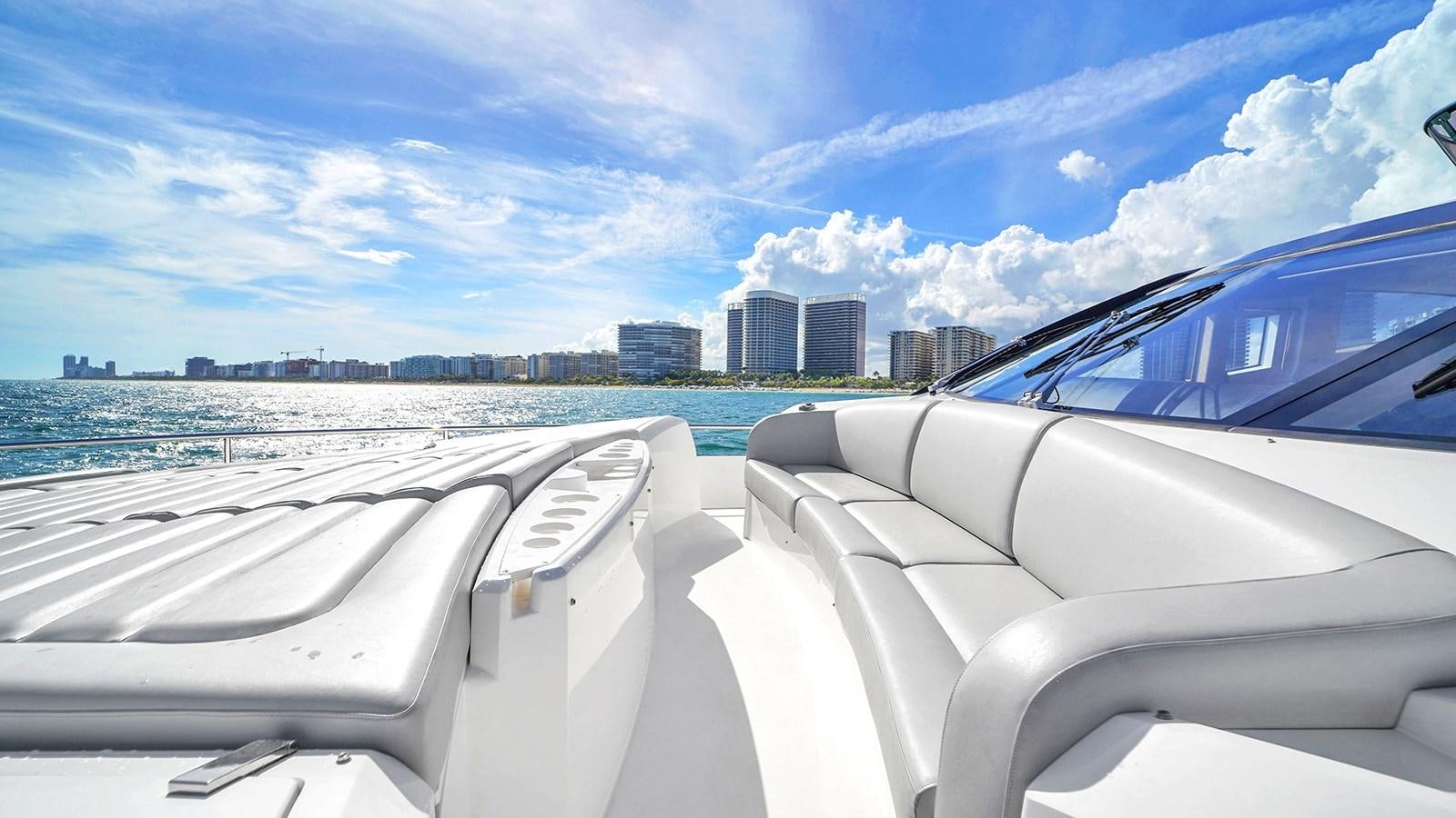 a car driving on a road aboard M4 Yacht for Sale