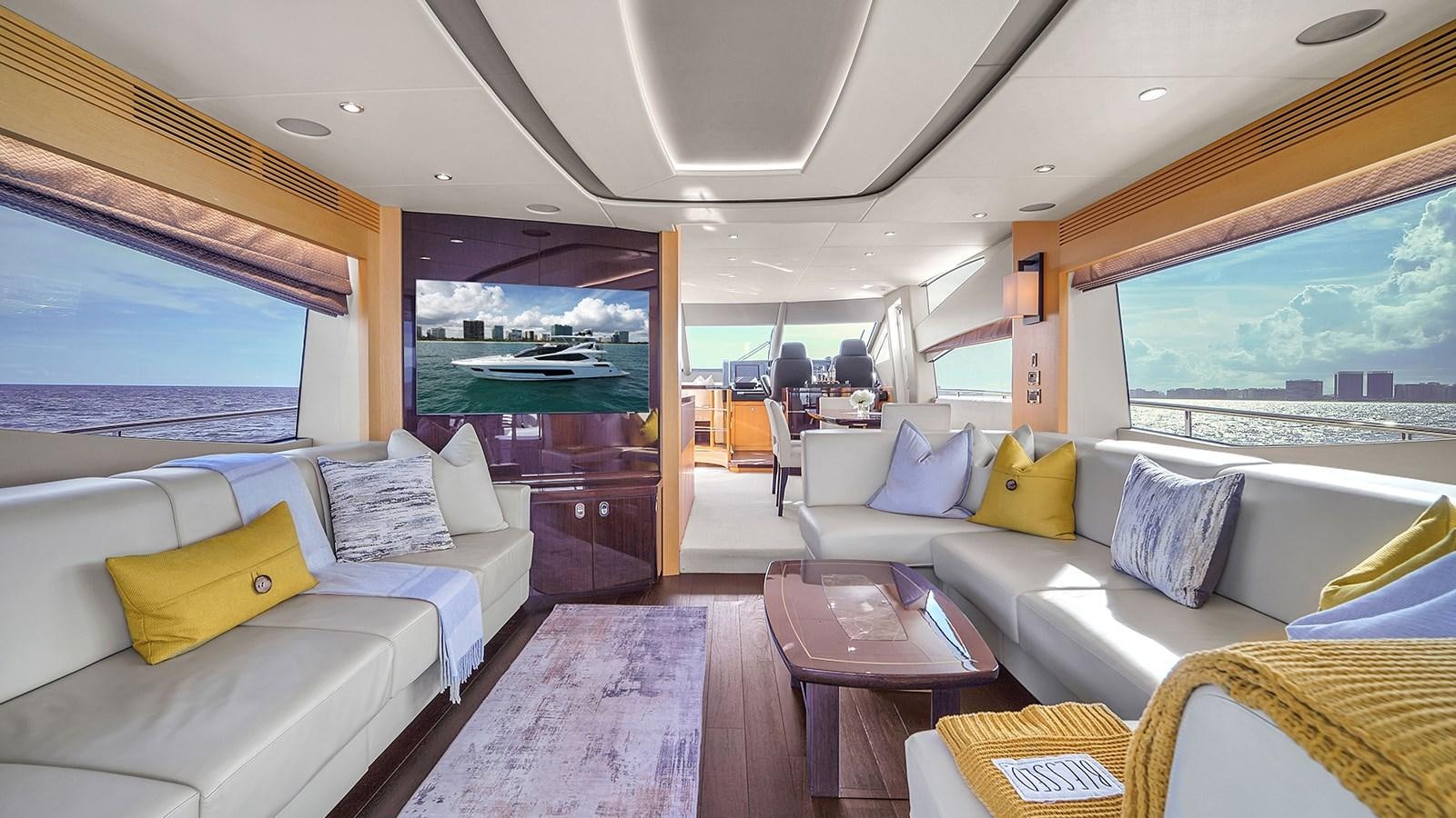 a large living room with a large window aboard M4 Yacht for Sale