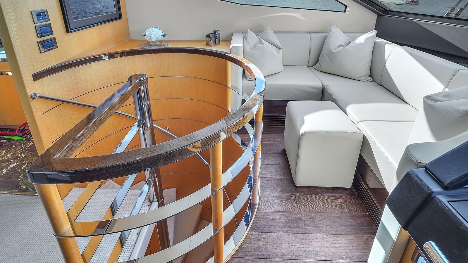 a bicycle on a stand in a living room aboard M4 Yacht for Sale