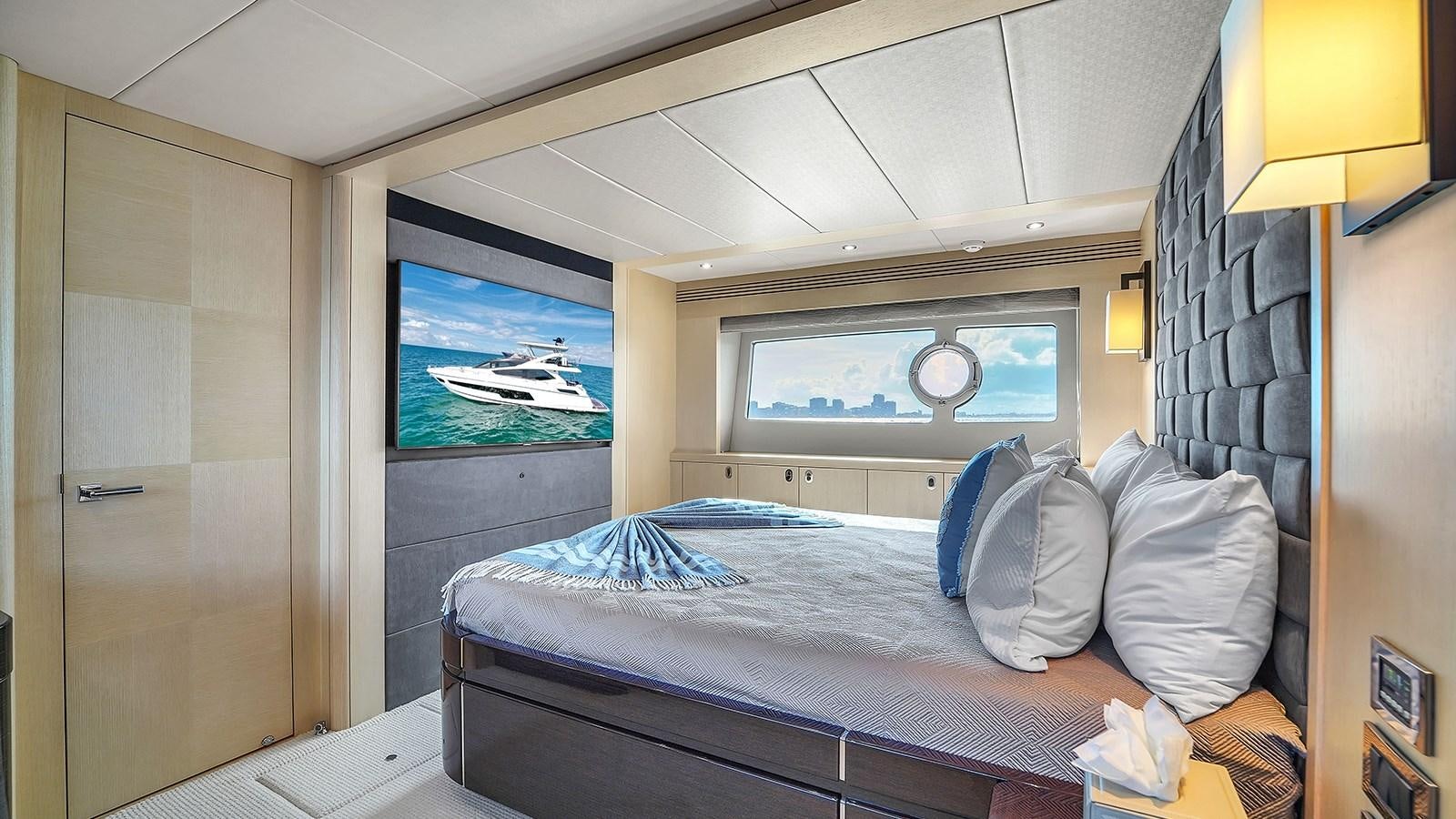 a bed in a room aboard M4 Yacht for Sale
