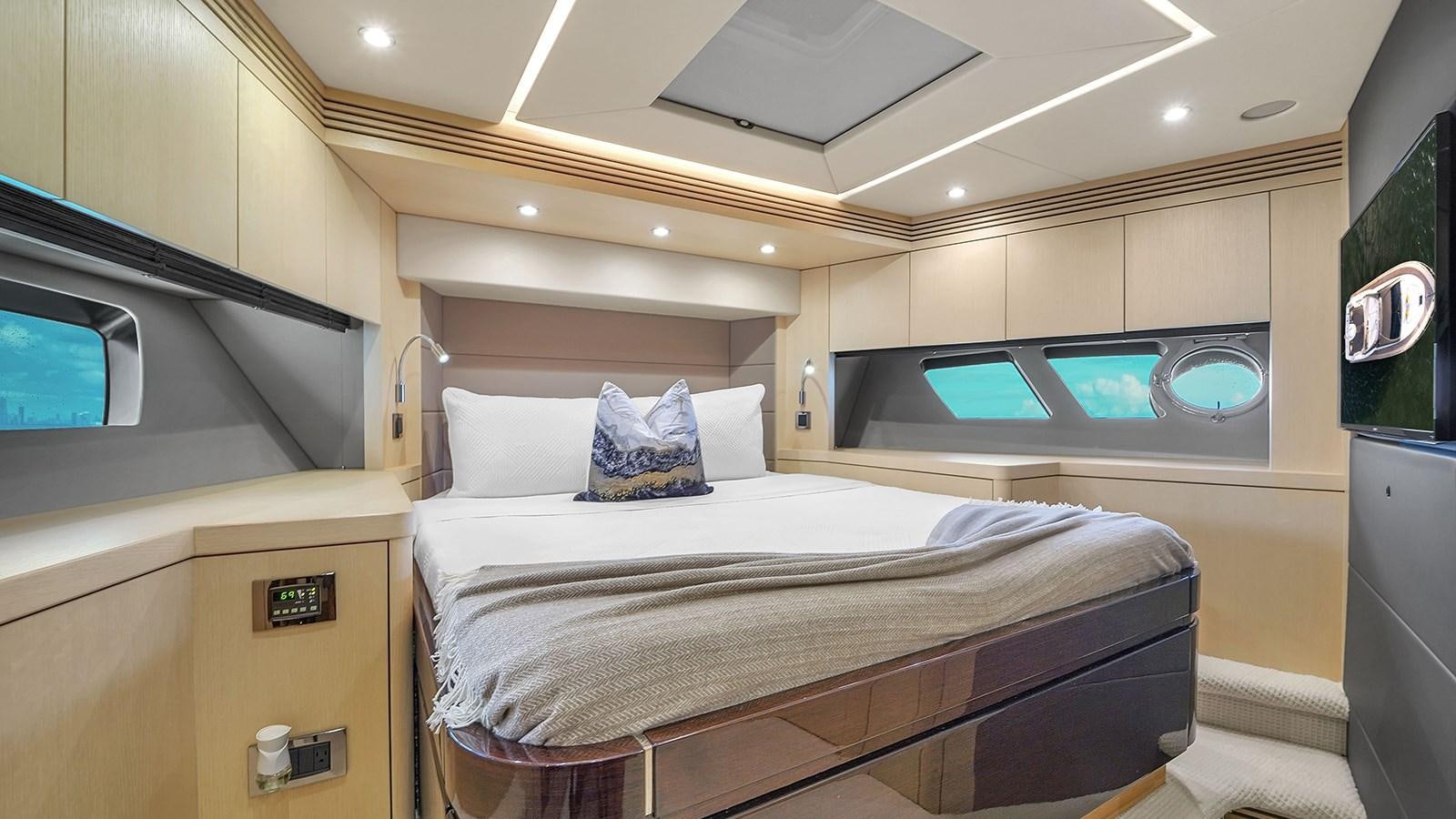 a bed in a room aboard M4 Yacht for Sale