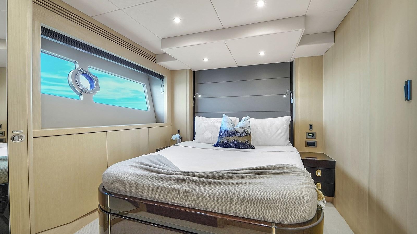 a bed in a room aboard M4 Yacht for Sale