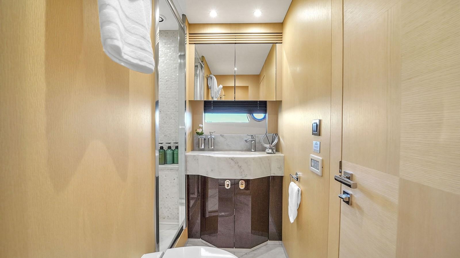 a bathroom with a sink and a shower aboard M4 Yacht for Sale