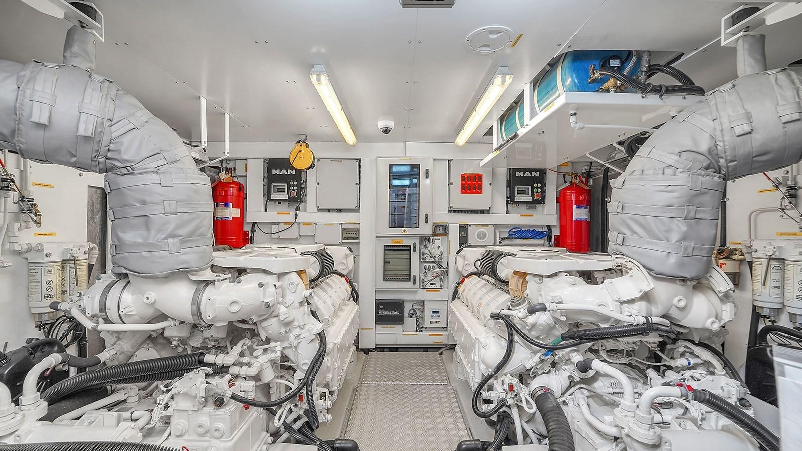 a room with a machine and machinery aboard M4 Yacht for Sale