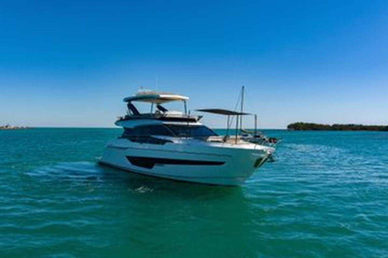 a boat in the water aboard 2021 FAIRLINE SQUADRON 68 Yacht for Sale