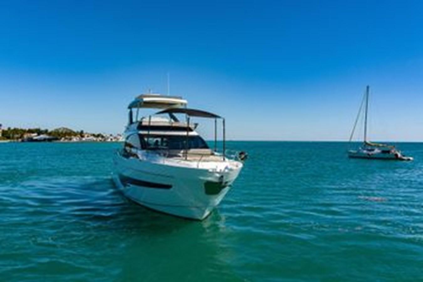 a couple of boats in the water aboard 2021 FAIRLINE SQUADRON 68 Yacht for Sale