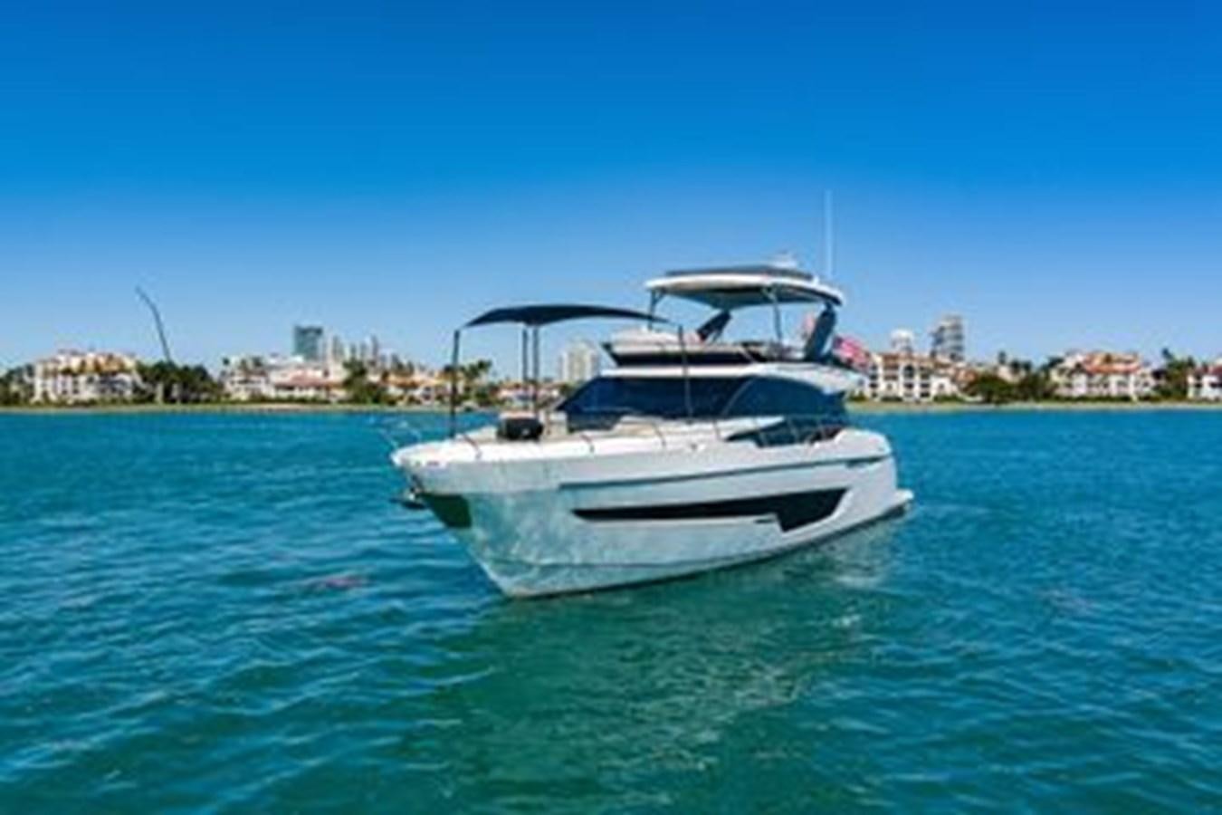 a boat in the water aboard 2021 FAIRLINE SQUADRON 68 Yacht for Sale