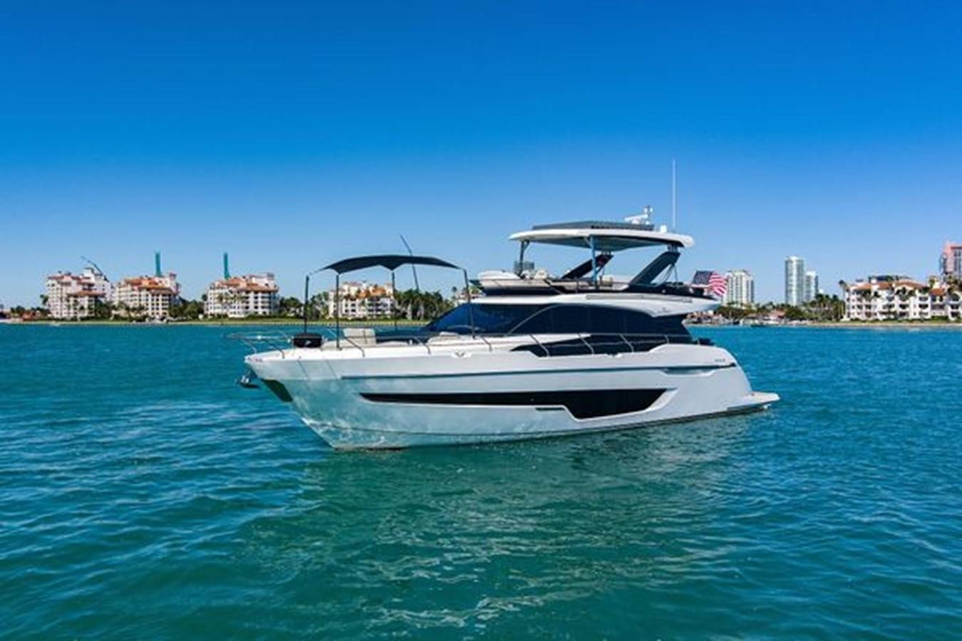 a white yacht in the water aboard 2021 FAIRLINE SQUADRON 68 Yacht for Sale