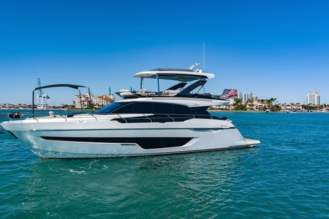 a white yacht in the water aboard 2021 FAIRLINE SQUADRON 68 Yacht for Sale
