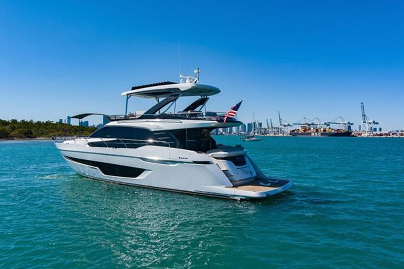 a boat on the water aboard 2021 FAIRLINE SQUADRON 68 Yacht for Sale