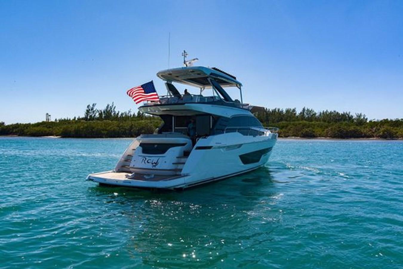 a boat on the water aboard 2021 FAIRLINE SQUADRON 68 Yacht for Sale