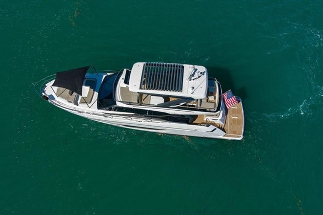 a boat in the water aboard 2021 FAIRLINE SQUADRON 68 Yacht for Sale