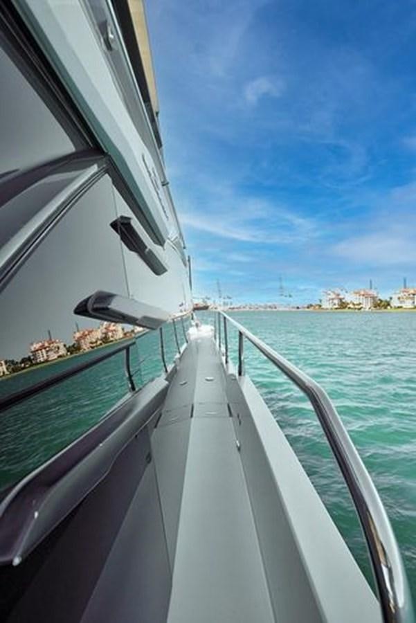 a boat on the water aboard 2021 FAIRLINE SQUADRON 68 Yacht for Sale
