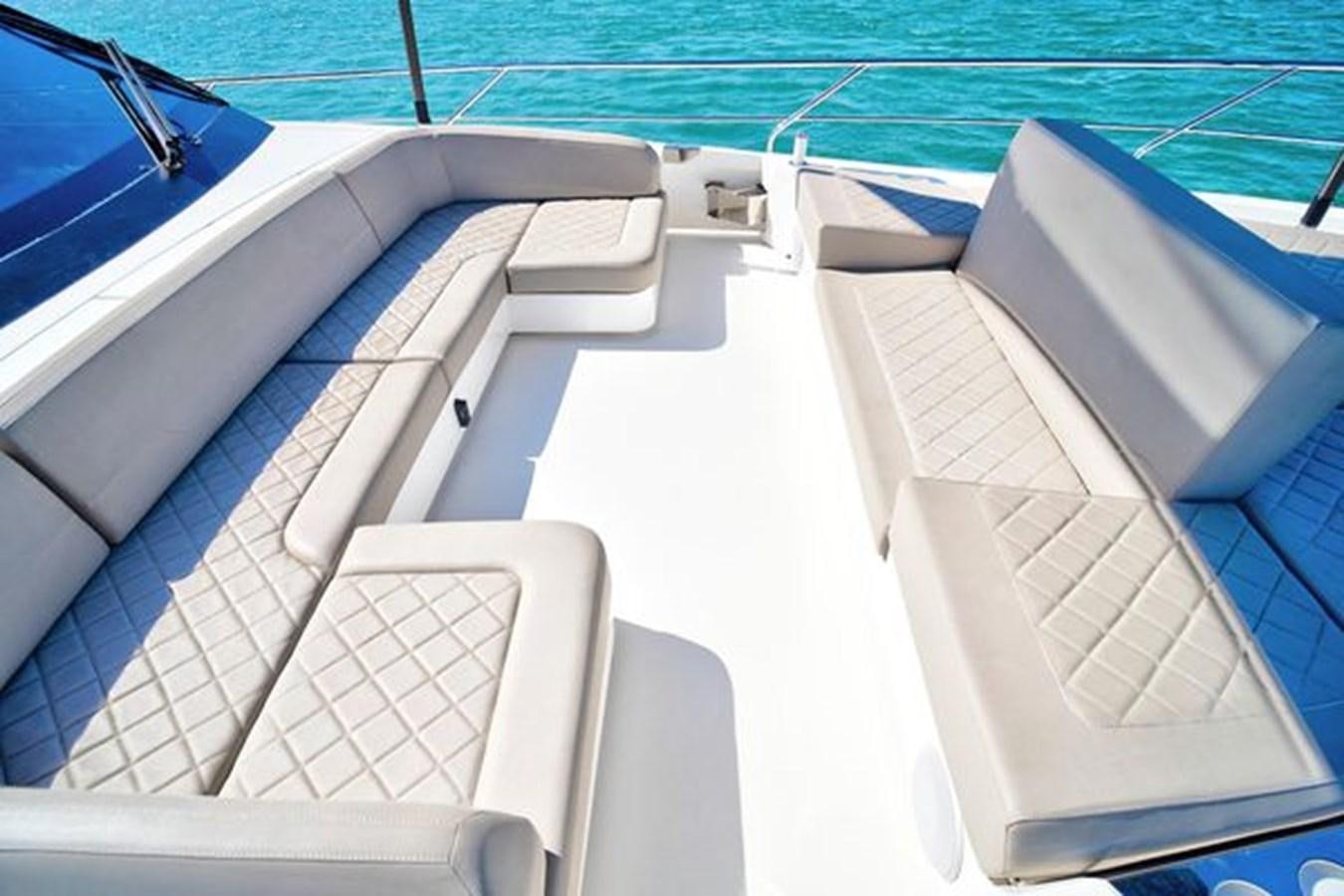 a boat on the water aboard 2021 FAIRLINE SQUADRON 68 Yacht for Sale