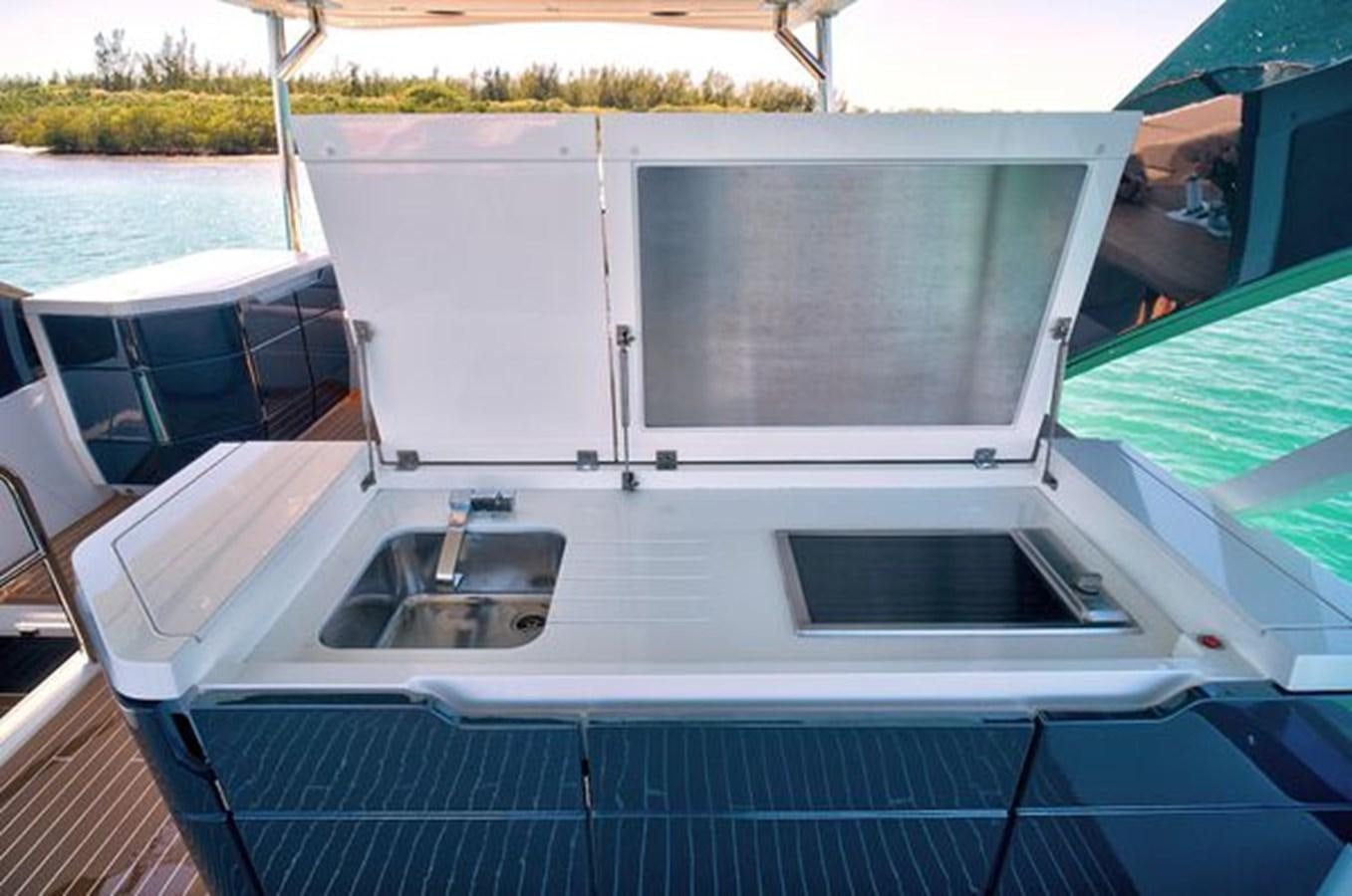 a boat with a sink on it aboard 2021 FAIRLINE SQUADRON 68 Yacht for Sale