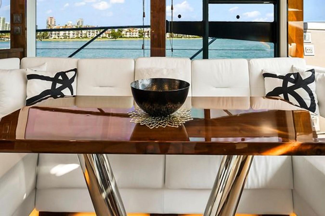 a bowl of food on a table aboard 2021 FAIRLINE SQUADRON 68 Yacht for Sale