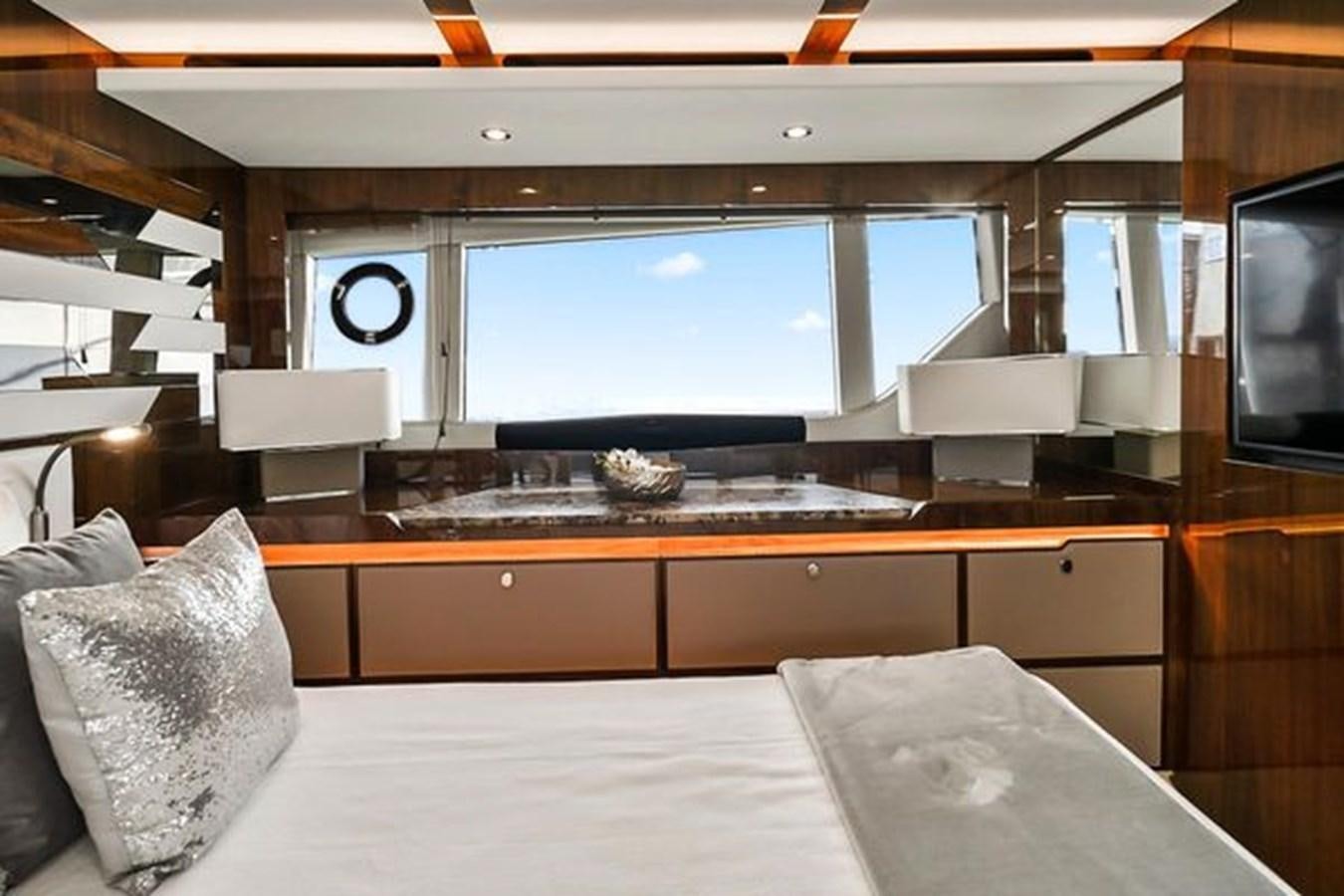 a room with a large window aboard 2021 FAIRLINE SQUADRON 68 Yacht for Sale