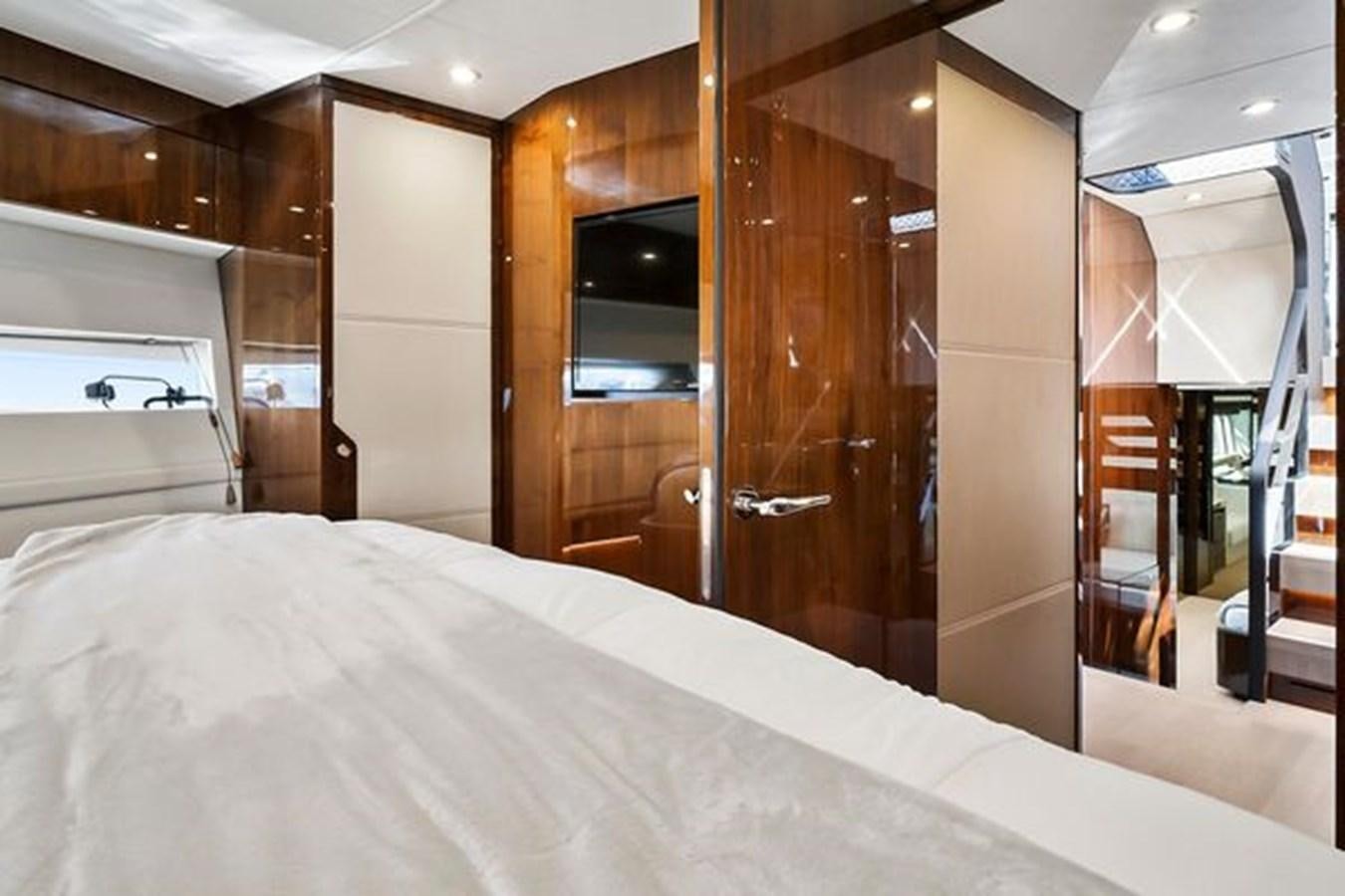 a bed in a room aboard 2021 FAIRLINE SQUADRON 68 Yacht for Sale
