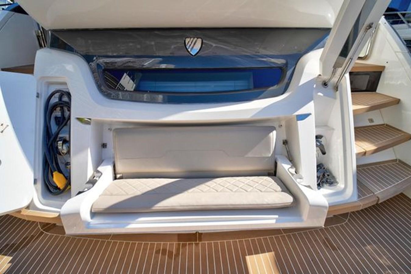 a close-up of a printer aboard 2021 FAIRLINE SQUADRON 68 Yacht for Sale