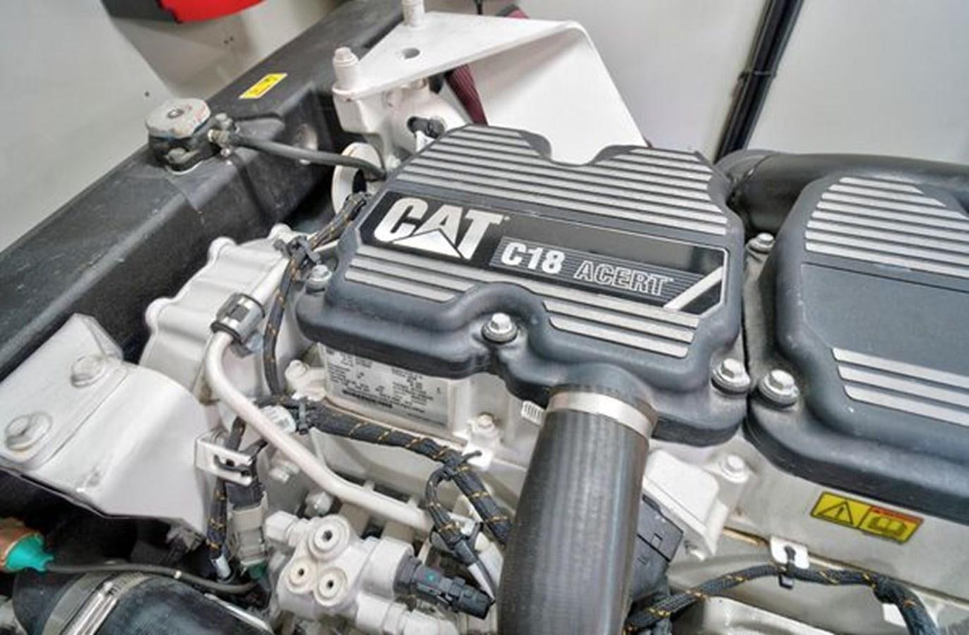 a car engine with a black bumper aboard 2021 FAIRLINE SQUADRON 68 Yacht for Sale
