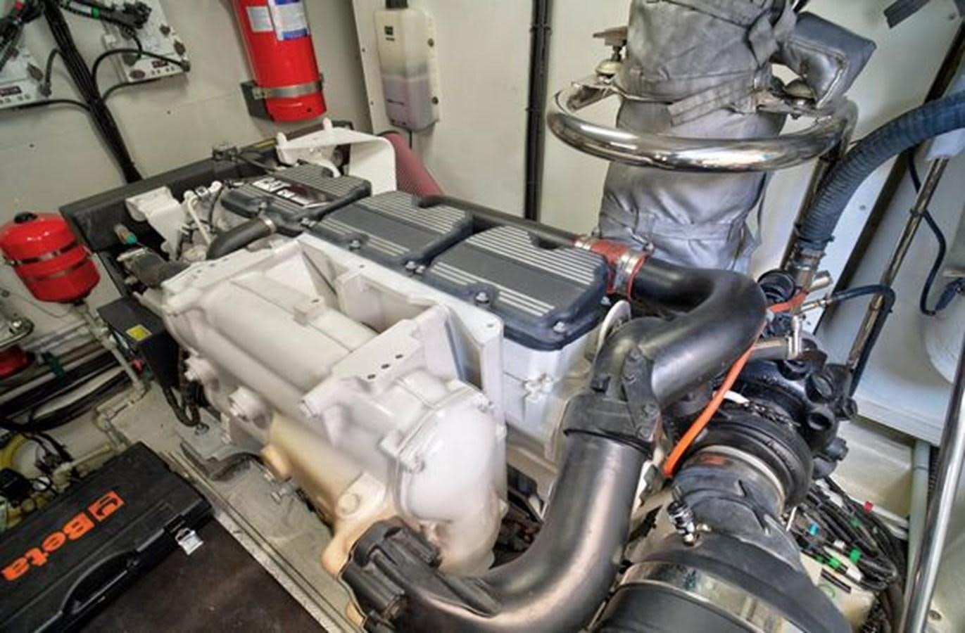 a car engine with a hood aboard 2021 FAIRLINE SQUADRON 68 Yacht for Sale
