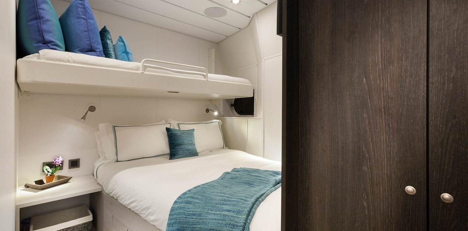 a bed in a room aboard AXIS Yacht for Sale