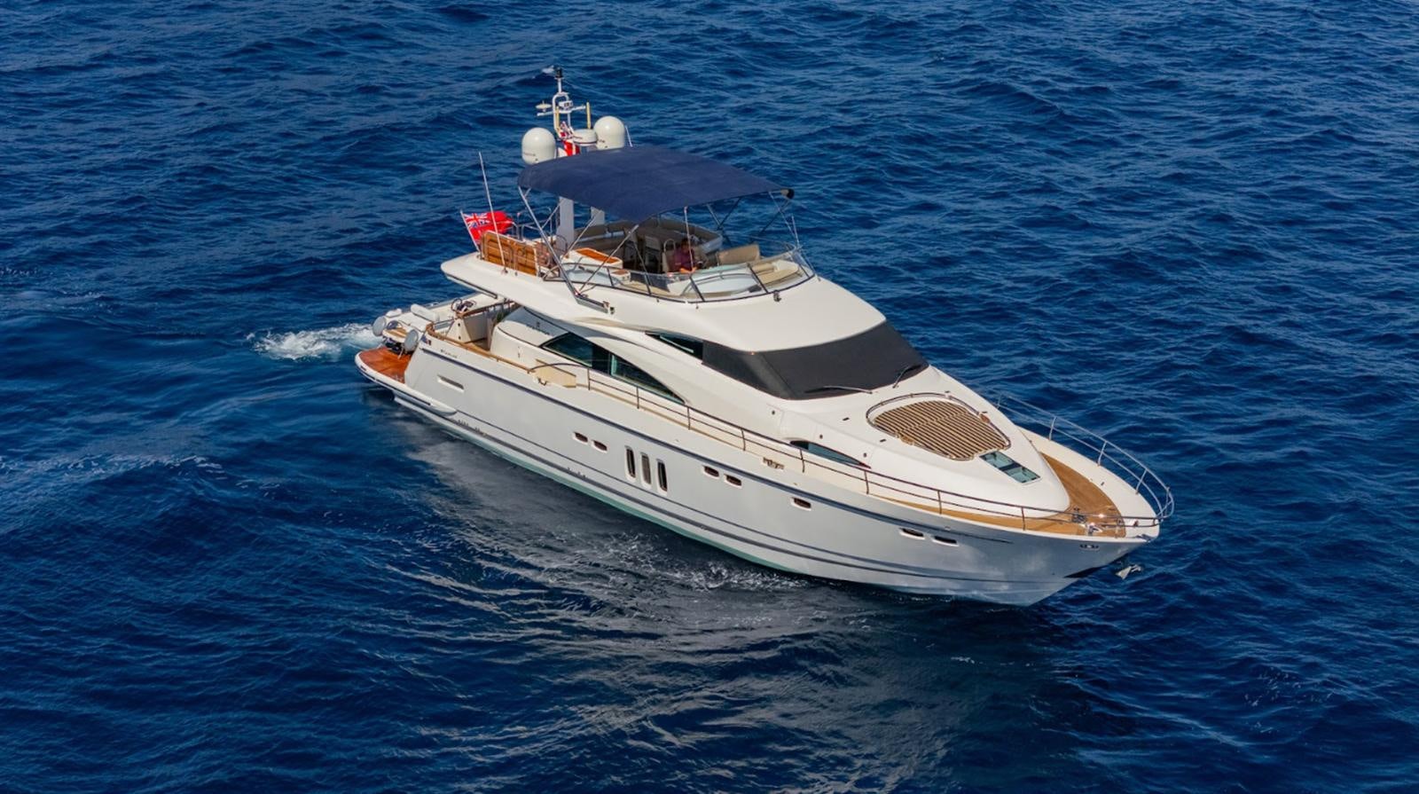 a white yacht in the water aboard FAIRLINE SQUADRON 70 - 2010 Yacht for Sale